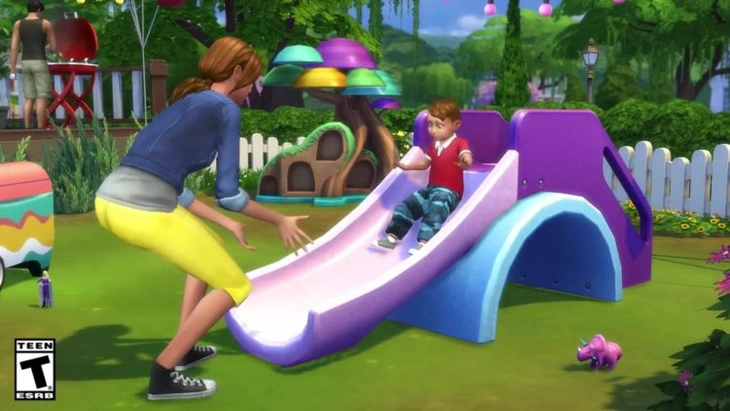 опекун играет с малышом